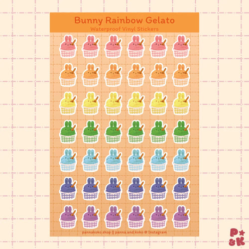 A sheet of bunny-themed gelato stickers on a peach grid background. The stickers feature bunnies in pastel rainbow colors served in gelato in gingham patterned paper cups with the header reading 'Bunny Rainbow Gelato' and 'Waterproof Vinyl Stickers.
